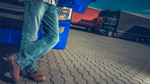 man standing by truck